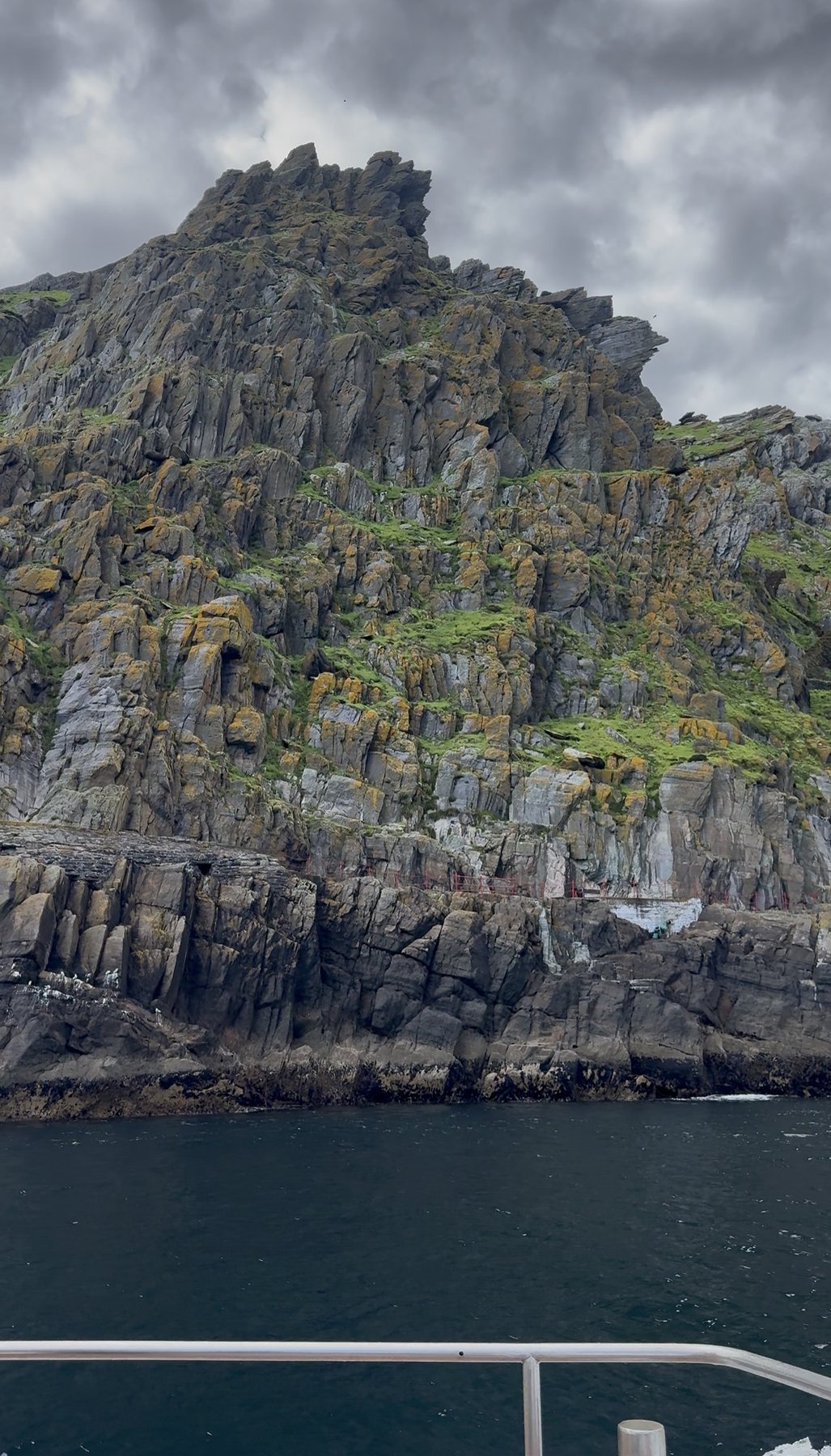 Vertical view of the Skellig rock face from the water